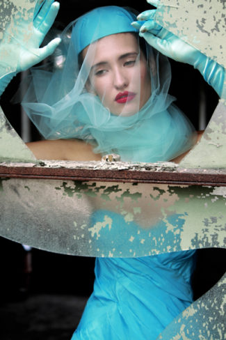 Woman Appearing Through Glass